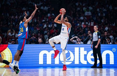Dominicans overcome record crowd, Clarkson to beat Philippines .
